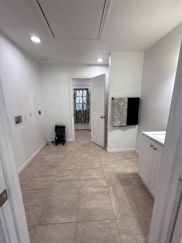 washroom with attic access, washer hookup, electric dryer hookup, and baseboards