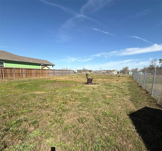 view of yard with fence