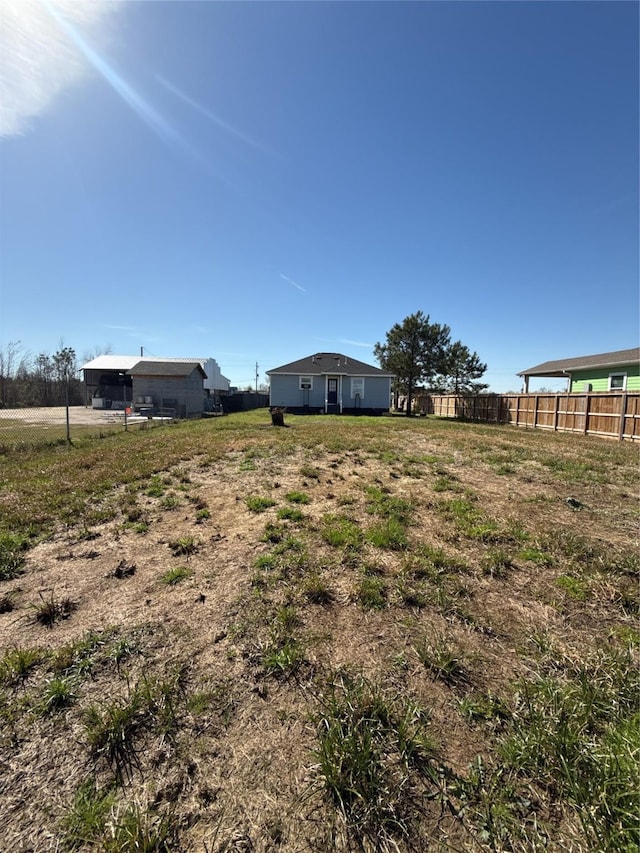 view of yard with fence