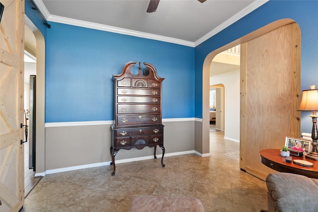 interior space featuring baseboards, arched walkways, and crown molding