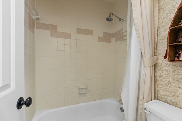 full bathroom with toilet, wallpapered walls, and shower / bath combination with curtain