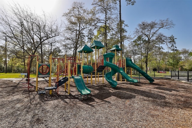 communal playground featuring fence