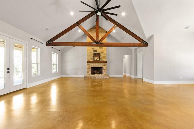 unfurnished living room featuring high vaulted ceiling, a fireplace, and baseboards