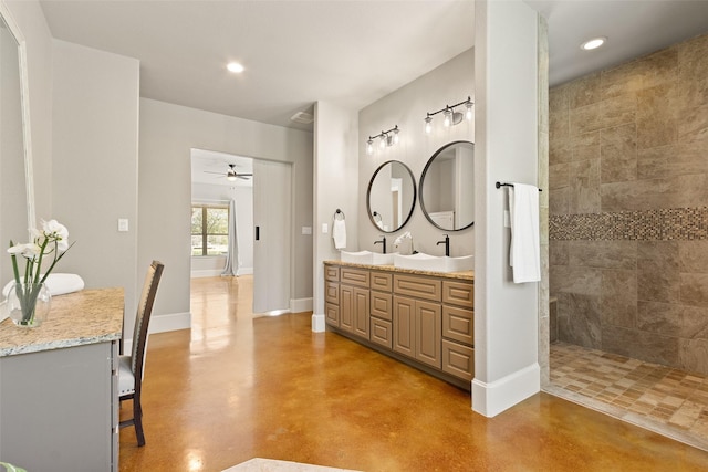 full bath featuring recessed lighting, tiled shower, finished concrete flooring, and baseboards