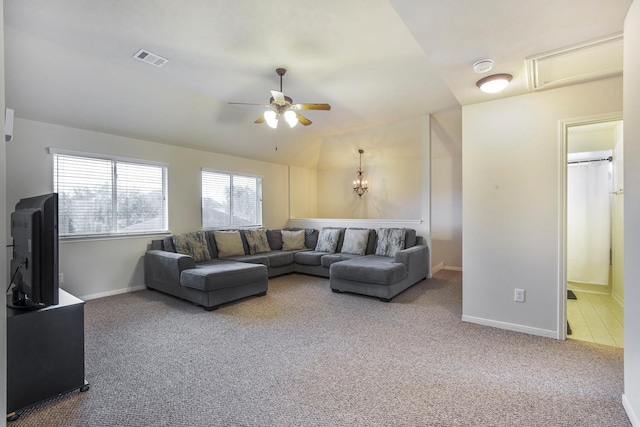 living area featuring carpet flooring, baseboards, lofted ceiling, and ceiling fan