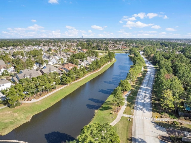 bird's eye view with a residential view and a water view