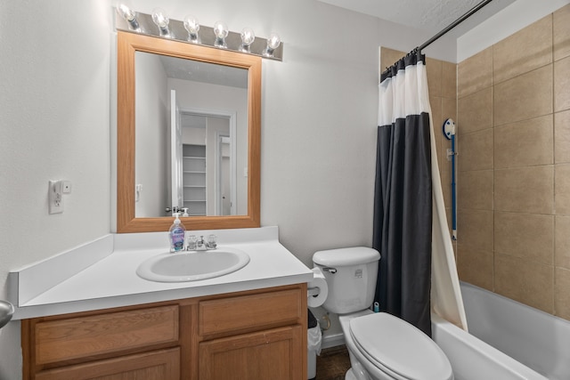 bathroom with toilet, shower / bath combo, and vanity