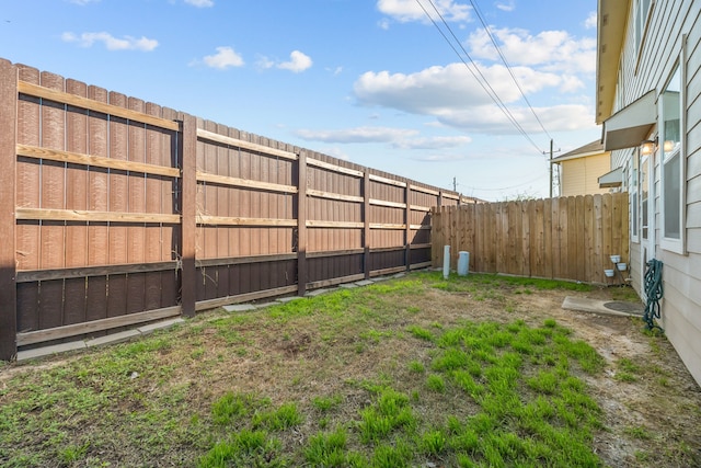 view of yard featuring a fenced backyard