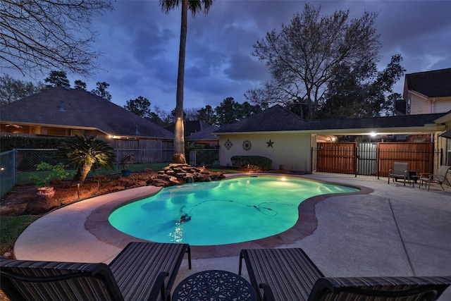 view of pool featuring a fenced in pool, a patio area, and a fenced backyard