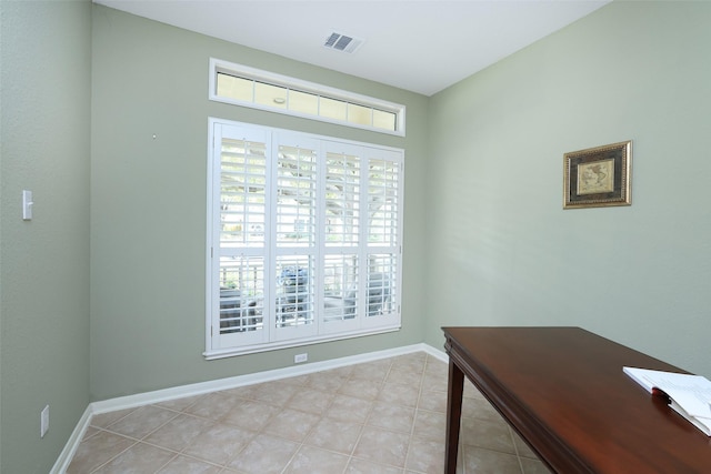 office area featuring baseboards and visible vents