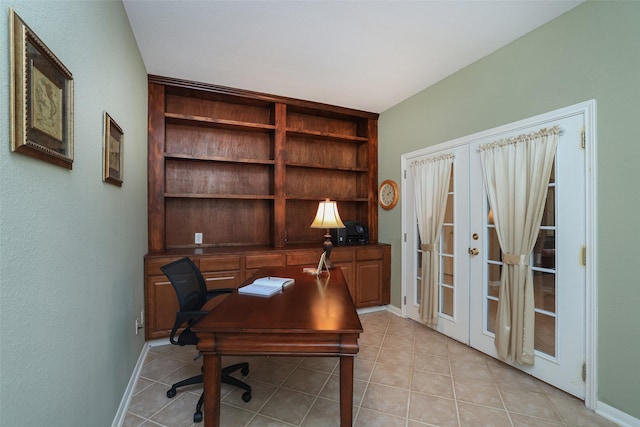 office space featuring baseboards, light tile patterned flooring, and french doors