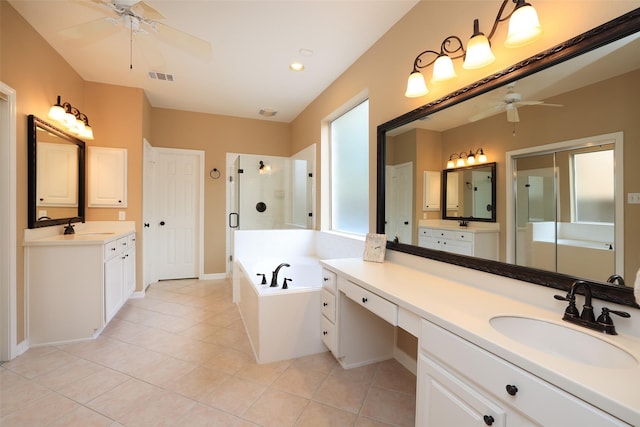 full bathroom featuring a sink, a ceiling fan, visible vents, a shower stall, and a bath