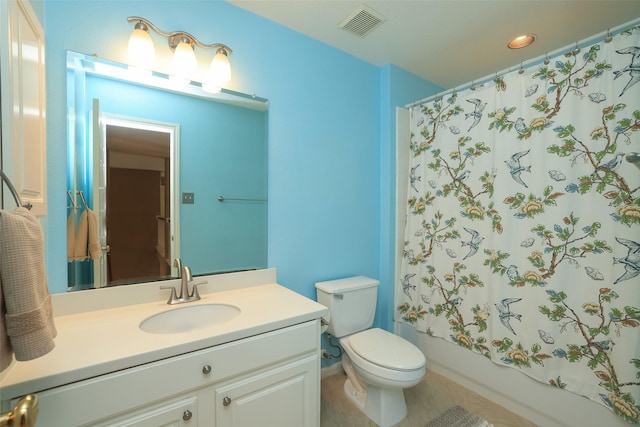 bathroom featuring shower / bathtub combination with curtain, visible vents, vanity, and toilet