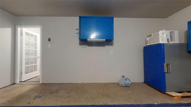 garage featuring an AC wall unit