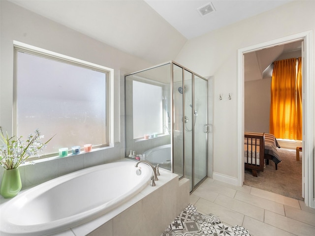 bathroom featuring a stall shower, tile patterned flooring, visible vents, and a bath