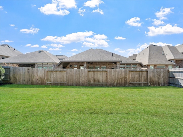 view of yard featuring a fenced backyard