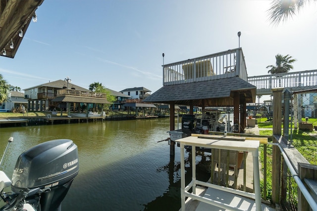 dock area with a water view