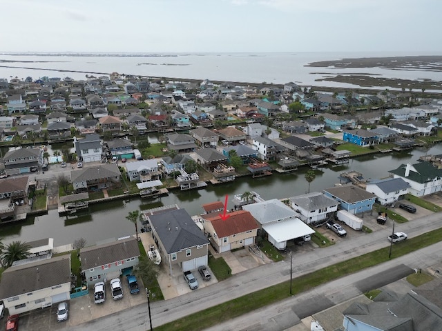 aerial view with a residential view and a water view