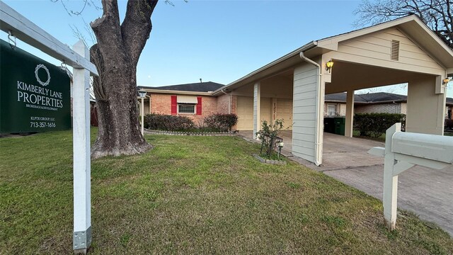 view of home's exterior featuring a lawn and brick siding