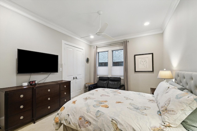 bedroom featuring light colored carpet, ornamental molding, recessed lighting, a closet, and a ceiling fan