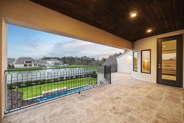 view of patio with a balcony