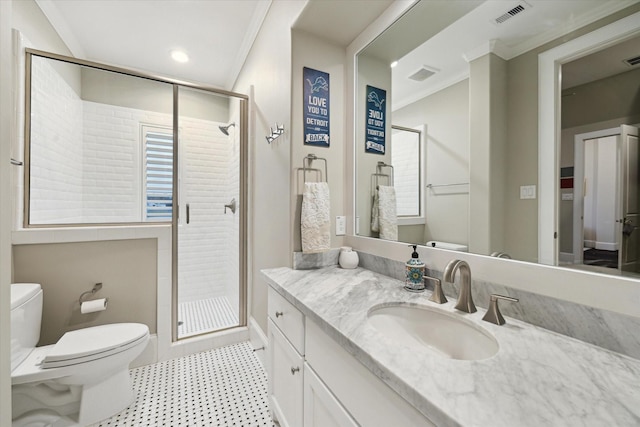 bathroom with visible vents, toilet, a shower stall, and crown molding