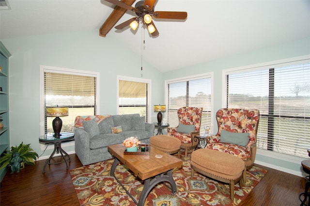 living area with lofted ceiling with beams, wood finished floors, a ceiling fan, and baseboards