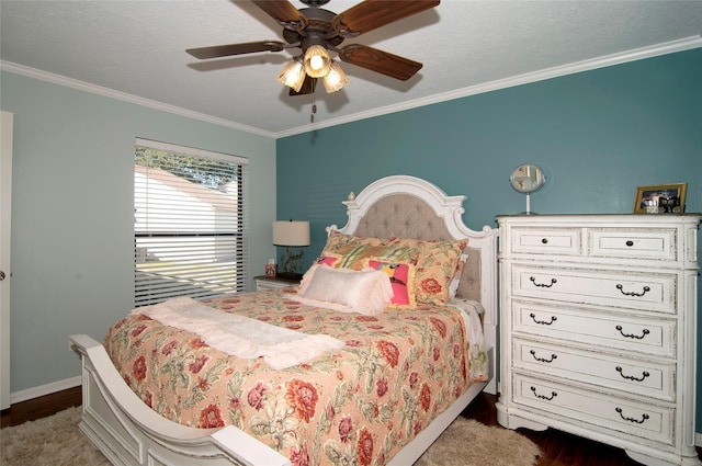 40 Driving Range Ln, Trinity, TX 75862 - bedroom featuring ceiling fan, a textured ceiling, wood finished floors, baseboards, and crown molding