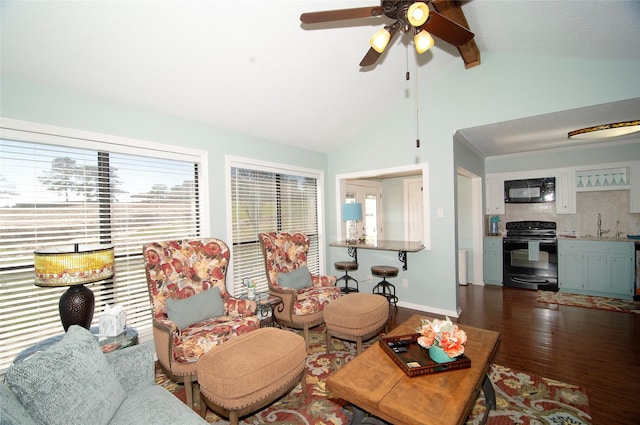 40 Driving Range Ln, Trinity, TX 75862 - living area with vaulted ceiling with beams, ceiling fan, baseboards, and dark wood finished floors