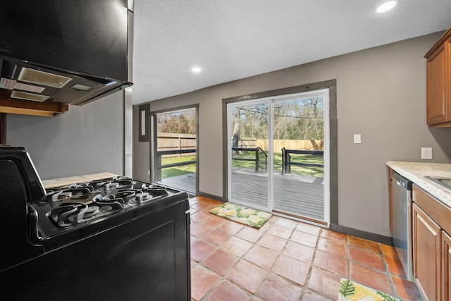 kitchen with brown cabinets, recessed lighting, black range with gas stovetop, dishwasher, and extractor fan