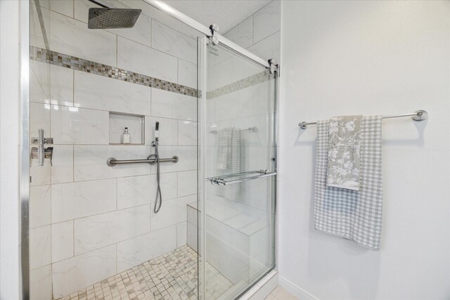 bathroom featuring a stall shower