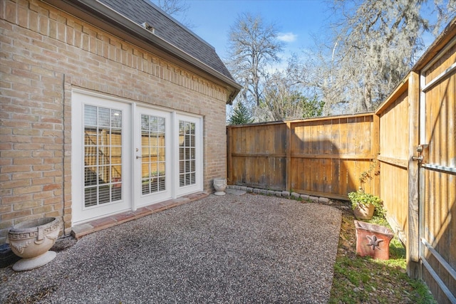 view of patio featuring fence