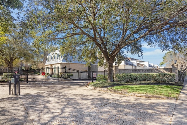 view of front facade with fence and a gate