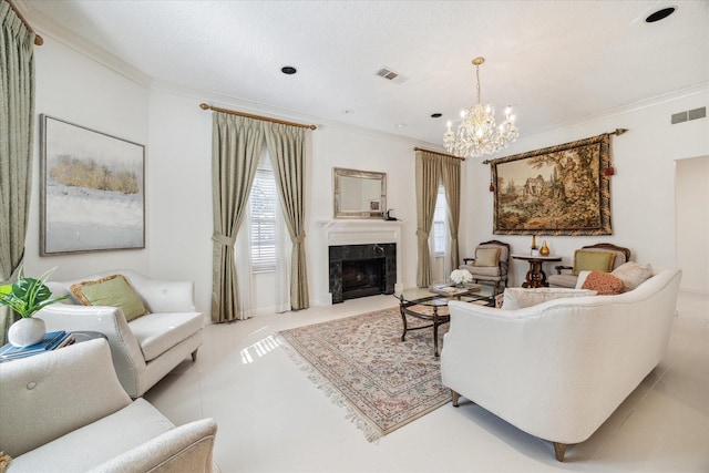 living area with an inviting chandelier, visible vents, a high end fireplace, and ornamental molding