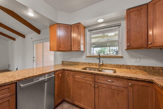 kitchen with stainless steel dishwasher, a sink, light stone countertops, and brown cabinets