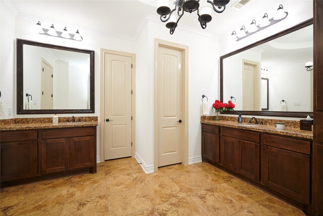 bathroom featuring crown molding, two vanities, visible vents, and a sink