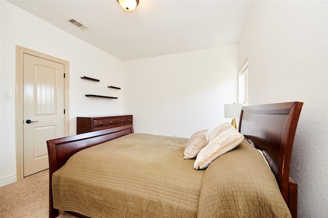 bedroom with carpet flooring and visible vents