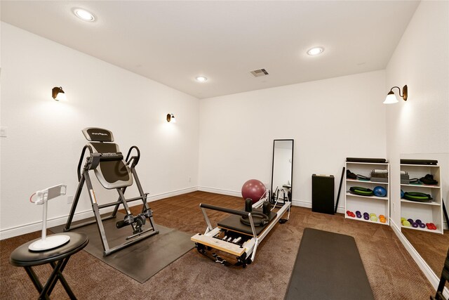 exercise area with recessed lighting, baseboards, visible vents, and carpet floors