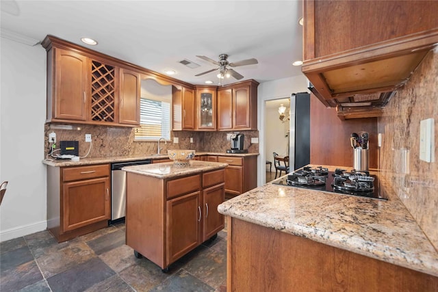 7719 Highmeadow Dr, Houston, TX 77063 - kitchen featuring visible vents, baseboards, stainless steel appliances, and decorative backsplash
