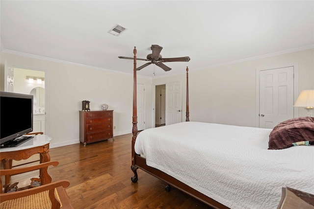 bedroom with ornamental molding, wood finished floors, and visible vents