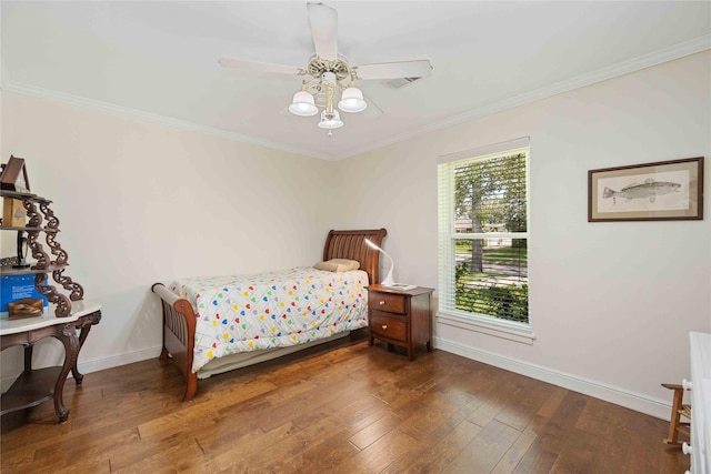 bedroom featuring ornamental molding, baseboards, ceiling fan, and hardwood / wood-style floors