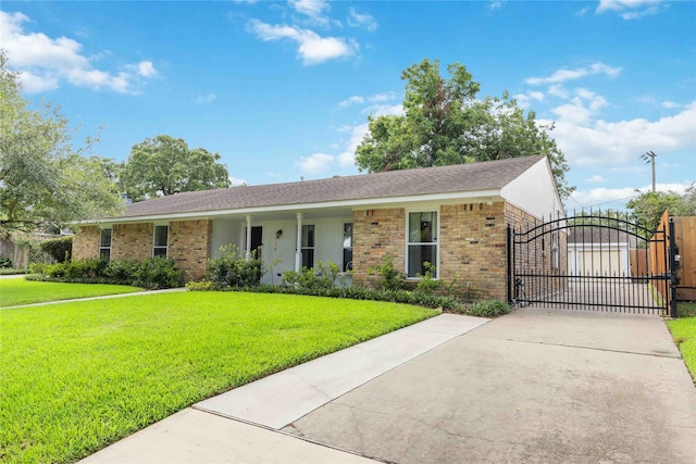 7719 Highmeadow Dr, Houston, TX 77063 - ranch-style home with a gate, brick siding, a front lawn, and driveway