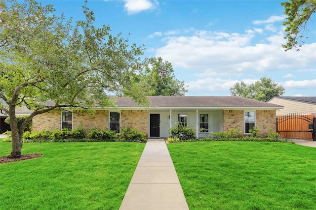 7719 Highmeadow Dr, Houston, TX 77063 - ranch-style home featuring roof with shingles, a gate, a front yard, and brick siding