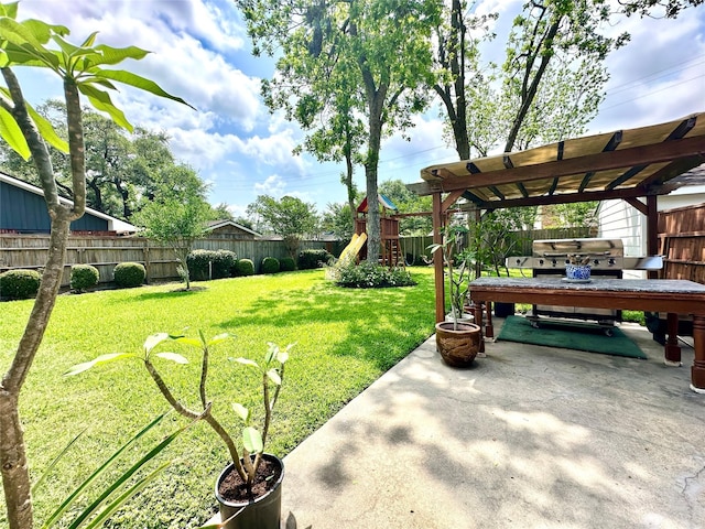 7719 Highmeadow Dr, Houston, TX 77063 - view of yard with a fenced backyard, a hot tub, a playground, and a patio area