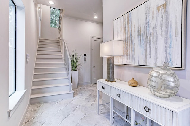 interior space featuring baseboards and recessed lighting