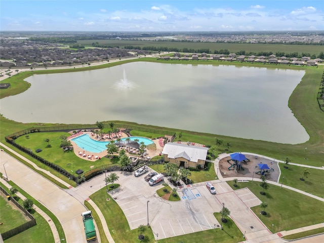 birds eye view of property featuring a water view