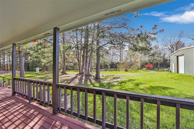 deck featuring a lawn