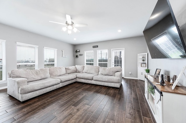 living area featuring dark wood finished floors, recessed lighting, baseboards, and a ceiling fan