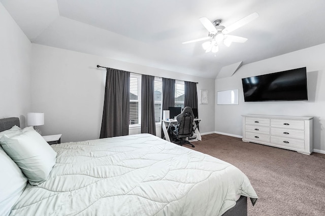 bedroom with baseboards, lofted ceiling, carpet, and a ceiling fan