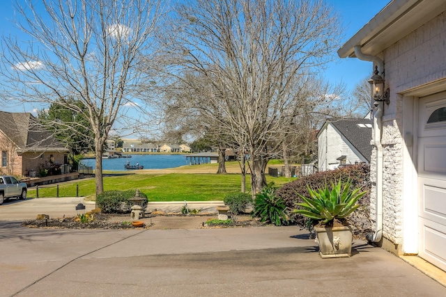 view of yard with a water view